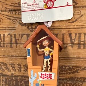 Disney Jessie Figure Ornament in Brown, tan, blue, yellow, red